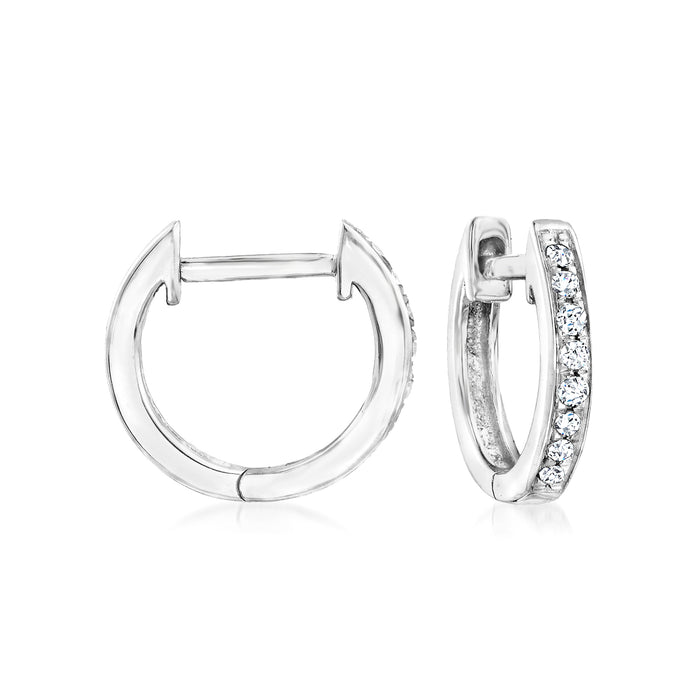 Sterling silver diamond huggie hoop earrings, one front and one side view