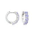 Sterling silver hoop earrings with purple tanzanite and clear topaz accents