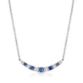 Curved sterling silver necklace with blue sapphire stones and lab-grown diamond accents