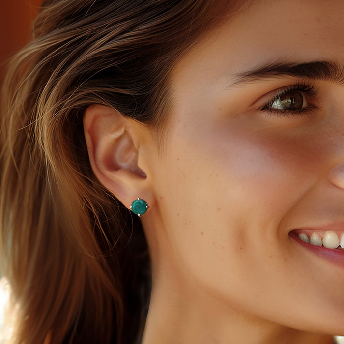 Round emerald stud earring with green gemstone and sterling silver post