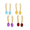 Multi-gemstone drop earrings set with leverback, blue, yellow, purple, and red stones