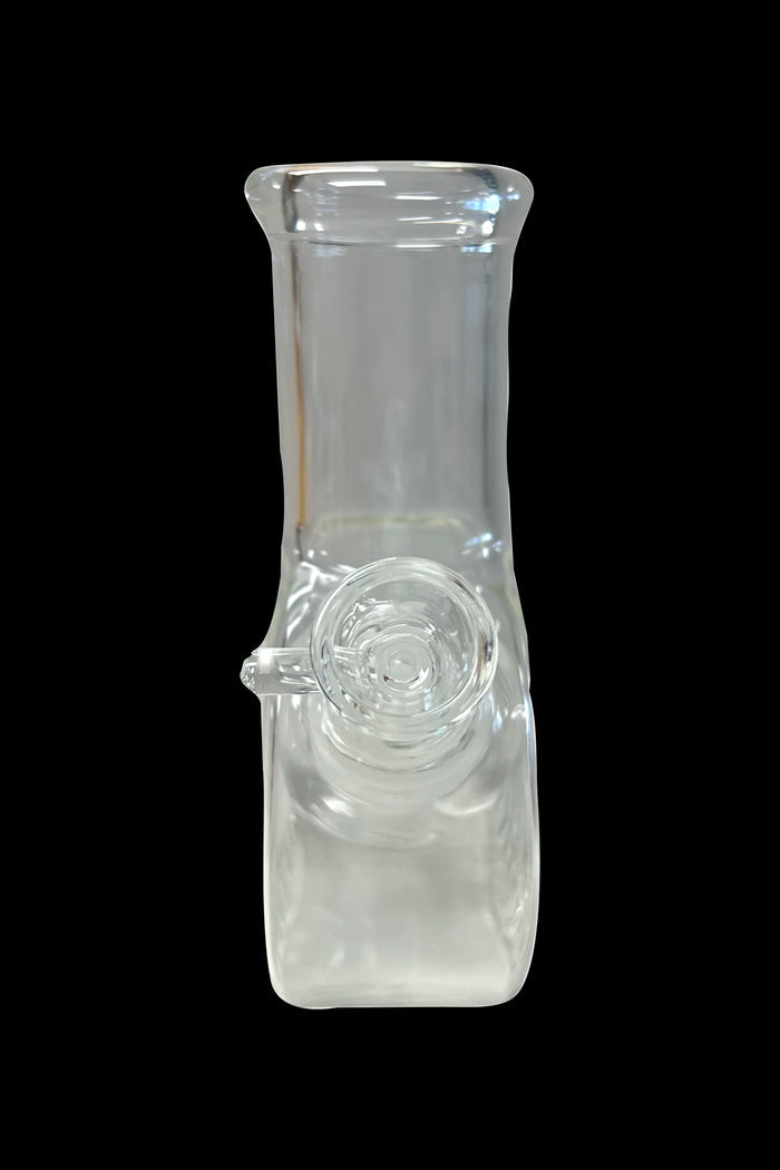 Clear glass bubbler water pipe for smoking cannabis.