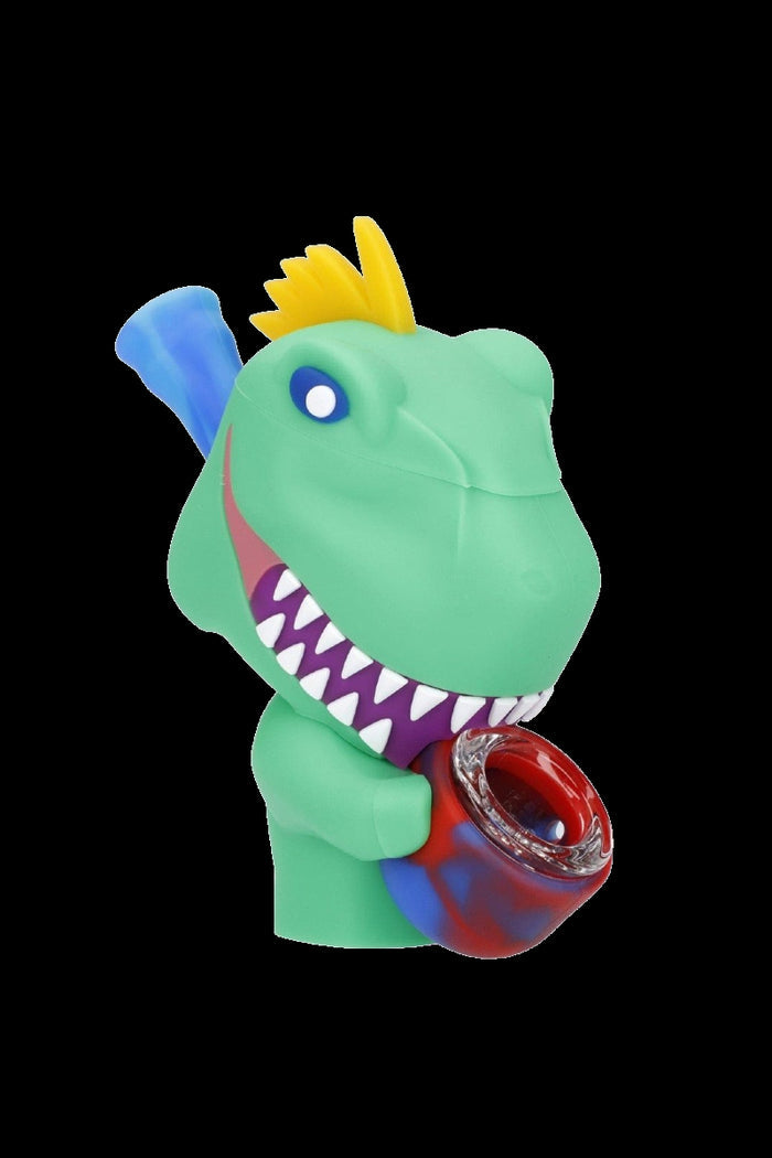 A cartoon-style Reptar figurine holding a red and white cannabis pipe.