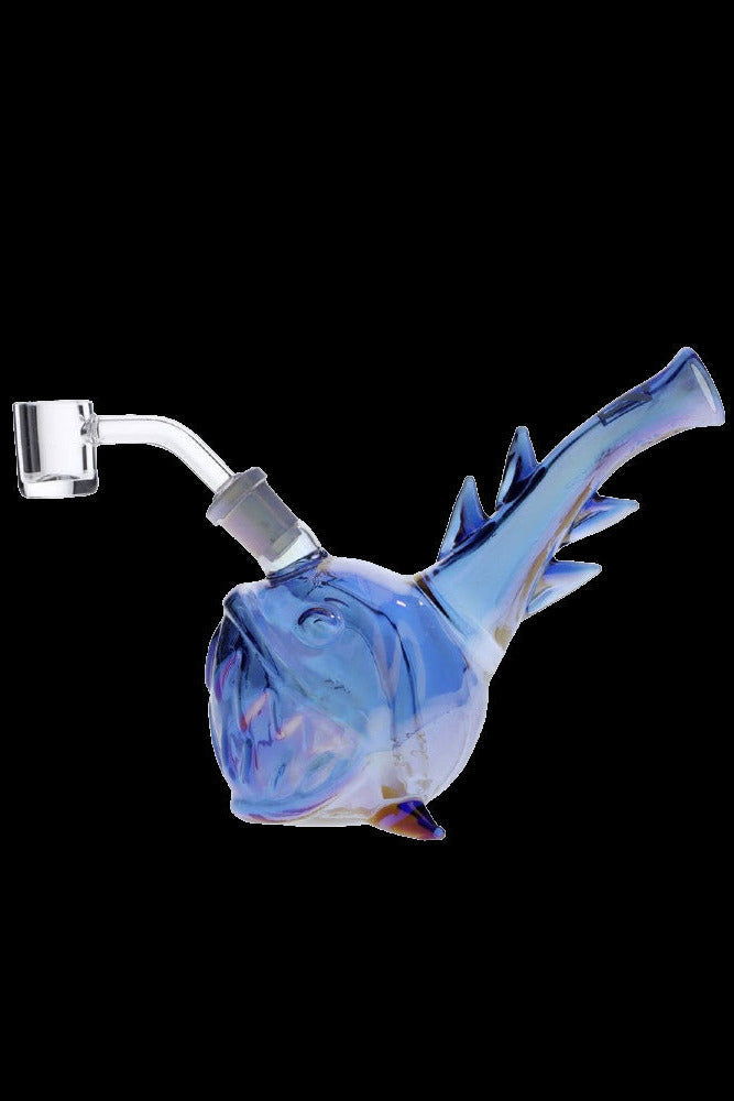 Blue glass dab rig shaped like a pufferfish with a quartz banger.