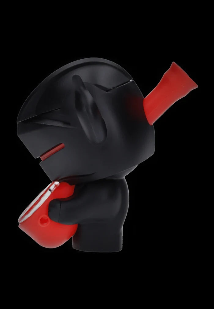 Side profile of the Daily High Club Knight Silipipe in matte black holding a red bowl and mouthpiece against a black background
