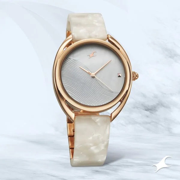 Fastrack Younique Quartz Analog Mother Of Pearl Dial Acetate & MetalStrap Watch For Girls 68036kd03