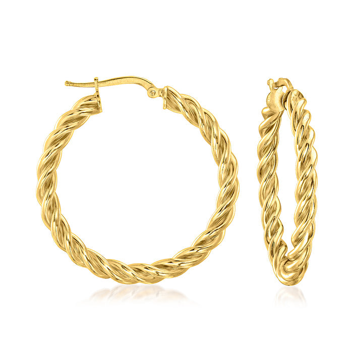 Twisted gold hoop earrings with twisted rope texture and hinged clasp