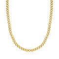 Gold bead necklace with small round beads in a continuous chain.
