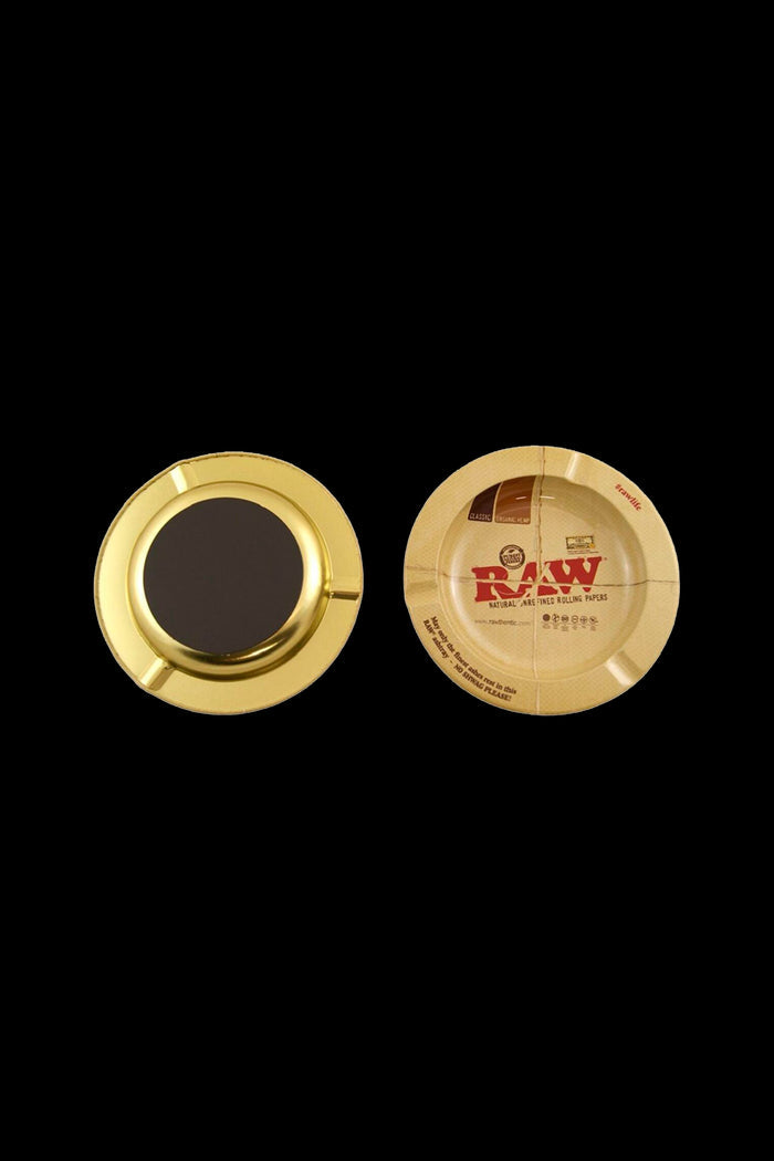 Gold metal grinder with a RAW rolling papers design.