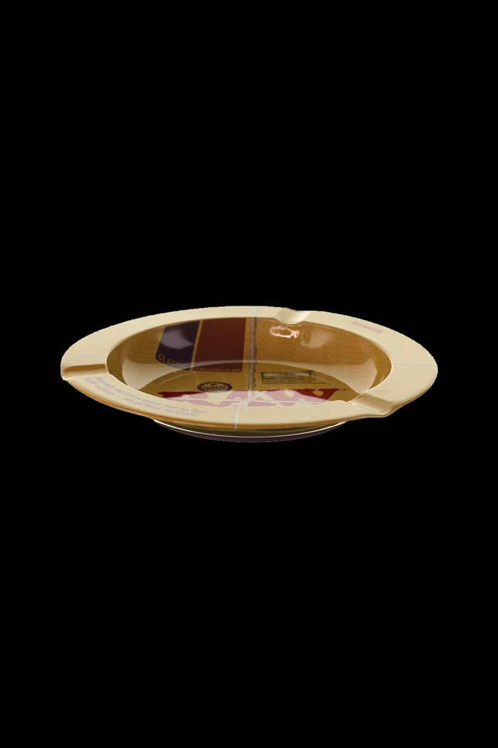 Gold cannabis smoking pipe with a patterned bowl.