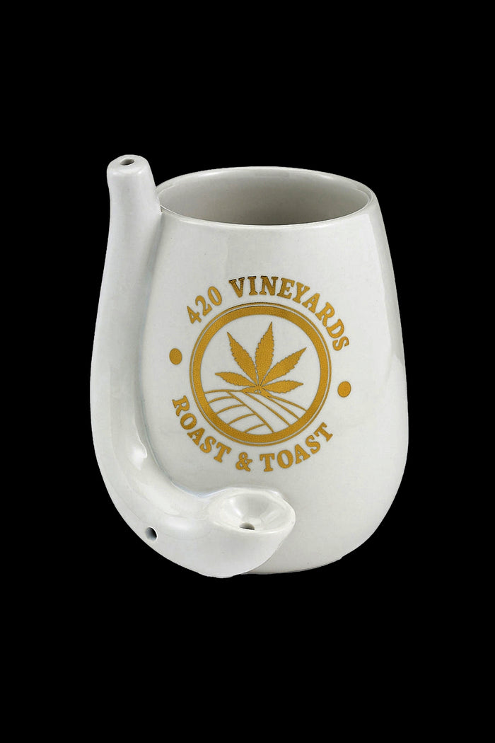 White ceramic oil cruet with a cannabis leaf logo reading "420 Vineyards Roast & Toast."