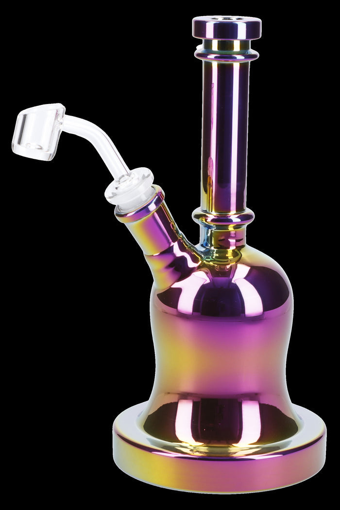 Iridescent glass dab rig with a quartz banger.