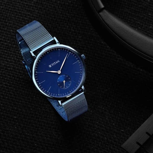 Titan Slimline Blue Dial Analog Stainless Steel Strap watch for Women 95142qm01